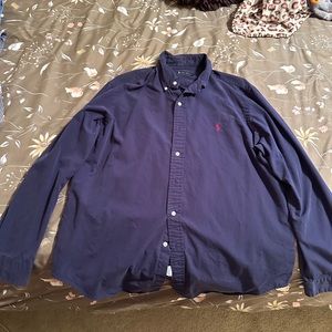 Blue long sleeve polo dress shirt. Comes from a non smoking home.